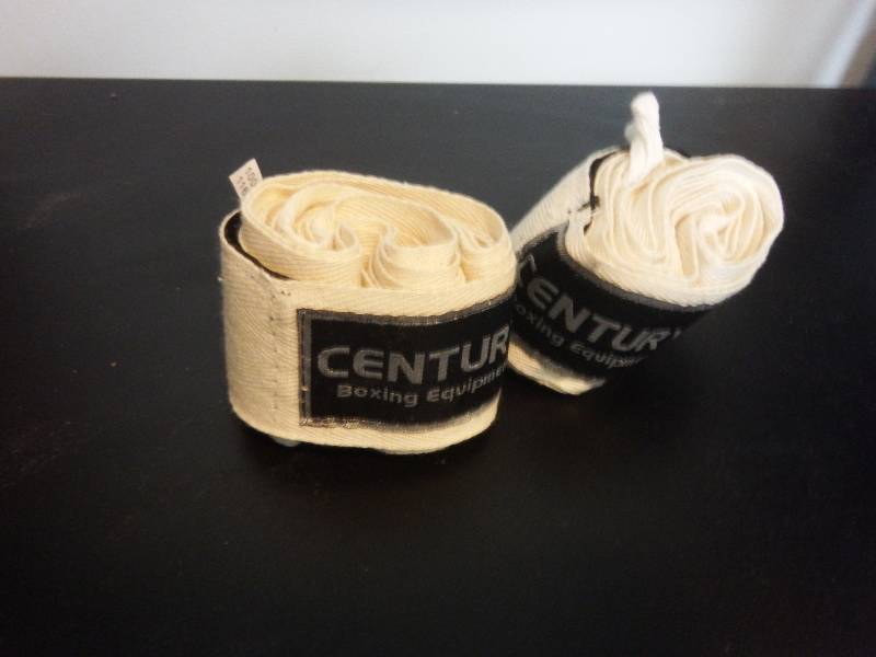 A Pair of Everlast Bag Gloves and Hand Wraps 116