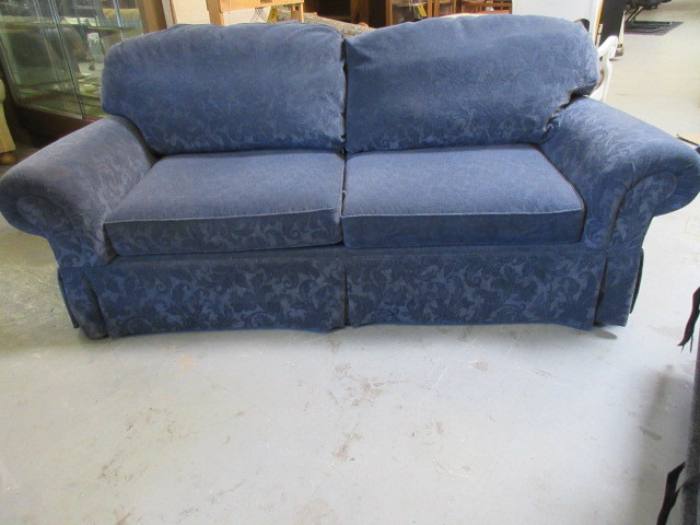 lot 427 image: PLUSH BLUE TWO CUSHION SOFA