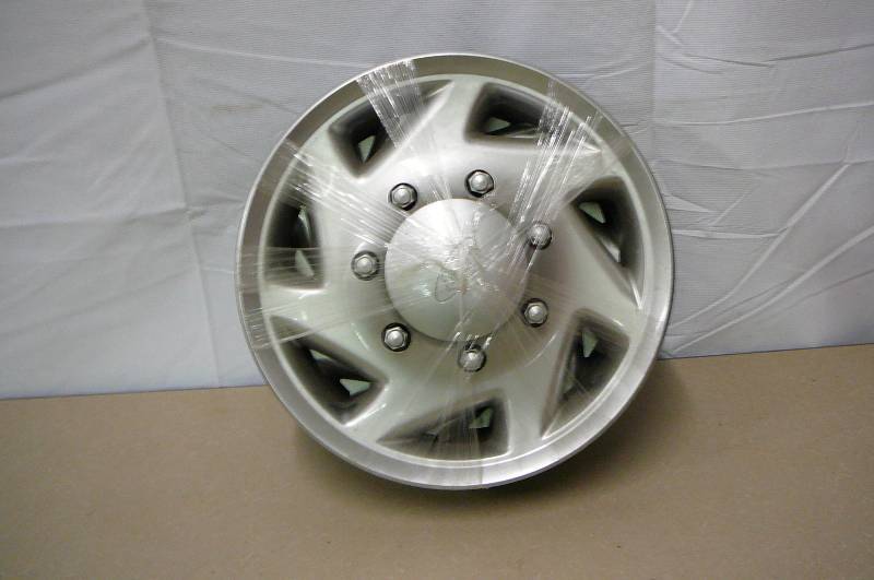 lot 13 image: Set of 4 Ford wheel covers 34 or 1 ton 8 hole Good shape