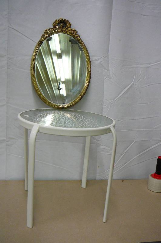 lot 21 image: 1 - 18 Metal and glass stand, 1 - 19 decorative mirror