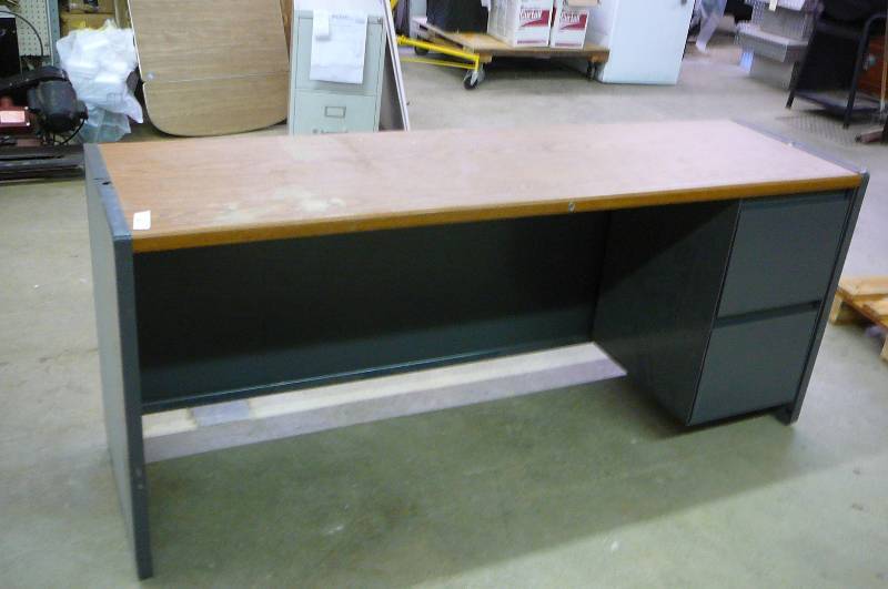 lot 15 image: Steel Desk 2 Drawer 65 w x 30 x 10 Top Woodgrain Look
