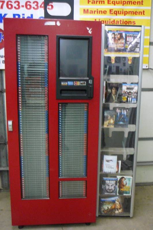 lot 1 image: DVD Now Kiosk Rental Machine