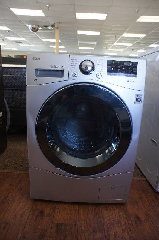lot 7 image: NEW SCRATCH AND DENT - LG MODEL # (WM3488HS) -  Front-Loading Electric WasherDryer - Silver  - MSRP $ 1999.99 - TESTED WORKS