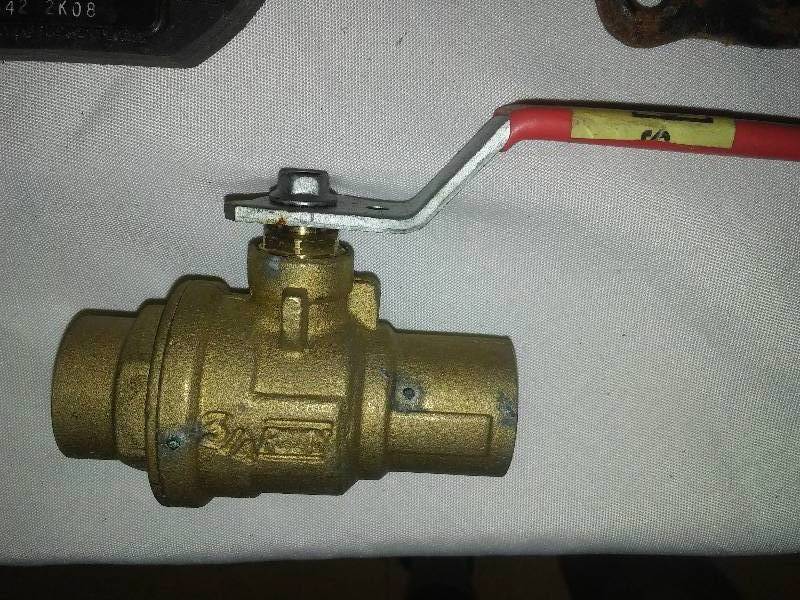 lot 264 image: Lug nuts, plumbing, parts holder and more