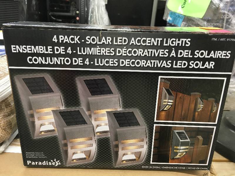 lot 571 image: POST LIGHTS SOLAR 4 PK, RETAIL $19.99