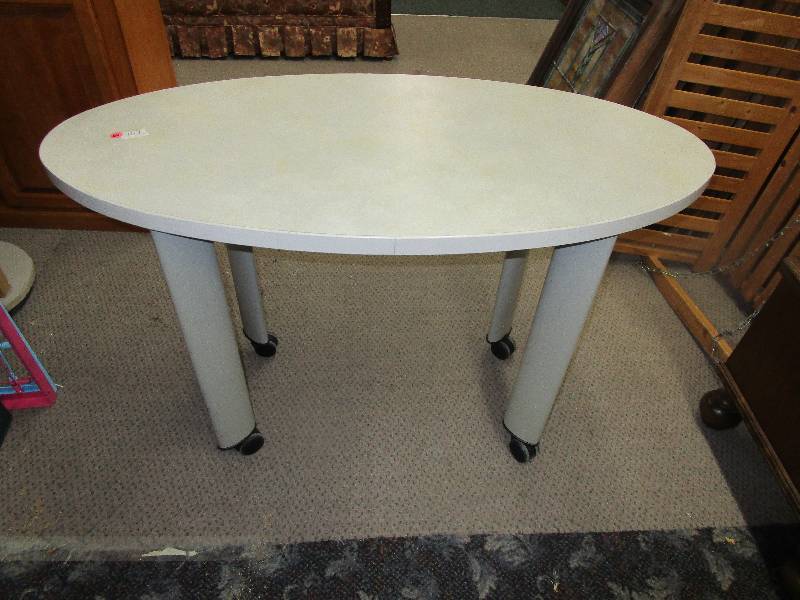 lot 62 image: Oval Table on Wheels  42 x 21 x 27