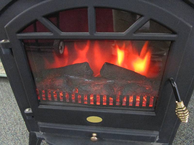 lot 83 image: Fire Place tested and Works