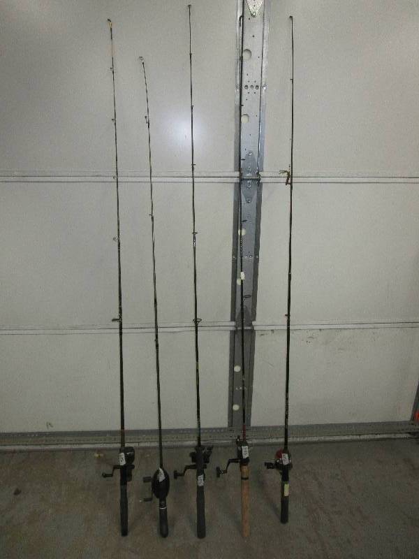 lot 123 image: Ugly Stick, Shakespear, Zebco, Daiwa fishing poles w various reels.