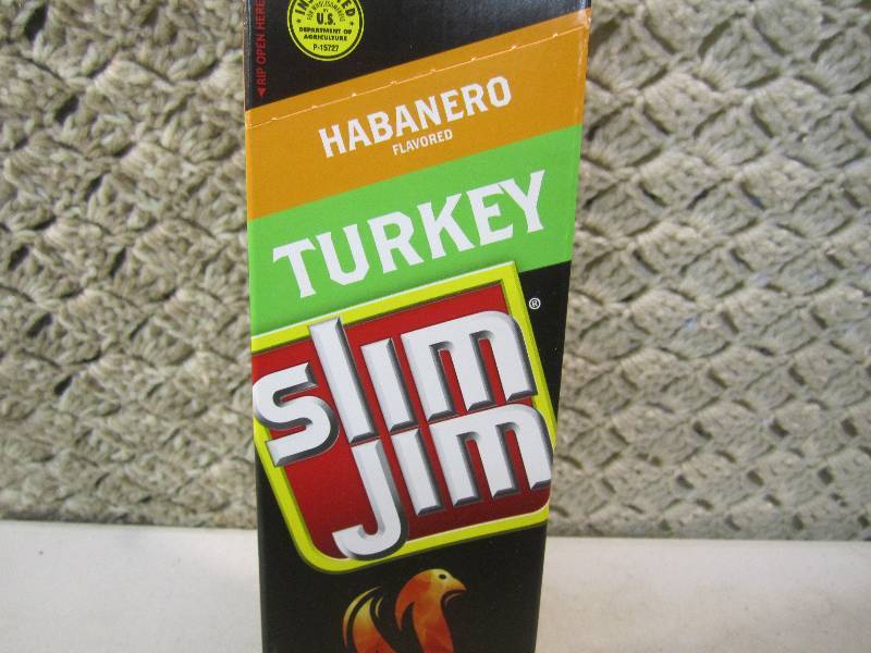 lot 62 image: Box of 24 Slim Jim Snack Sticks Hab...