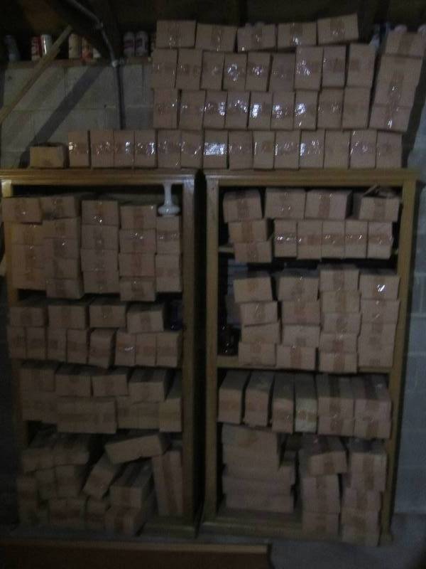 lot 403 image: Approximately 150 boxes of small vases, 4 - 6 inches tall.