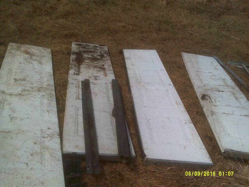 GARAGE DOOR PANELS AND TRACK