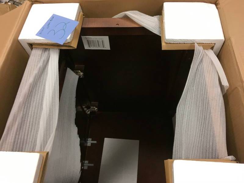 lot 32 image: Foremost Ashburn 24 in. W Bath Vanity Cabinet Only in Mahogany- New Open Box