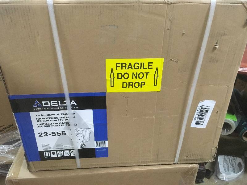 lot 43 image: Delta 15 Amp 13 in. Portable Thickness Planer open box in like new condition