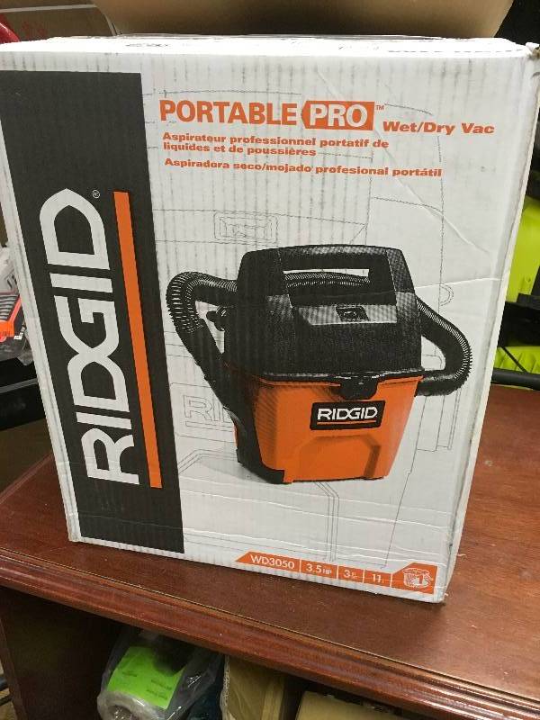 lot 48 image: Ridgid 3 gal. 3.5 Peak HP Portable Pro Wet Dry Vac Open Box not used