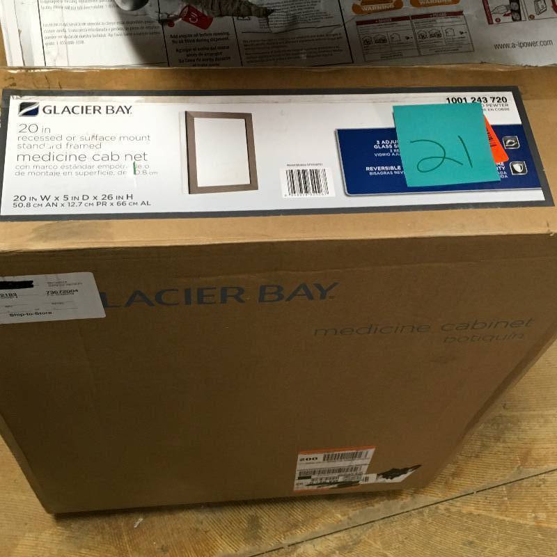 lot 21 image: Glacier Bay 20 in. x 26 in. Framed Aluminum Recessed or Surface -Mounted Bathroom Medicine Cabinet not used