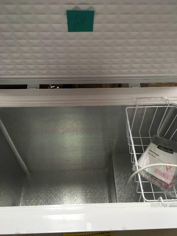 lot 64 image: Magic Chef 6.9 cu. ft. Chest Freezer in White few scratches not used