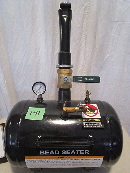 lot 141 image: Tire Bead Sealer 5 Gallon Tank