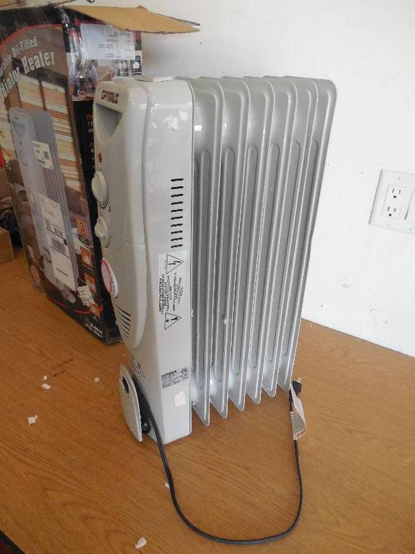 lot 25 image: Optimus Oil-Filled Radiator Heater