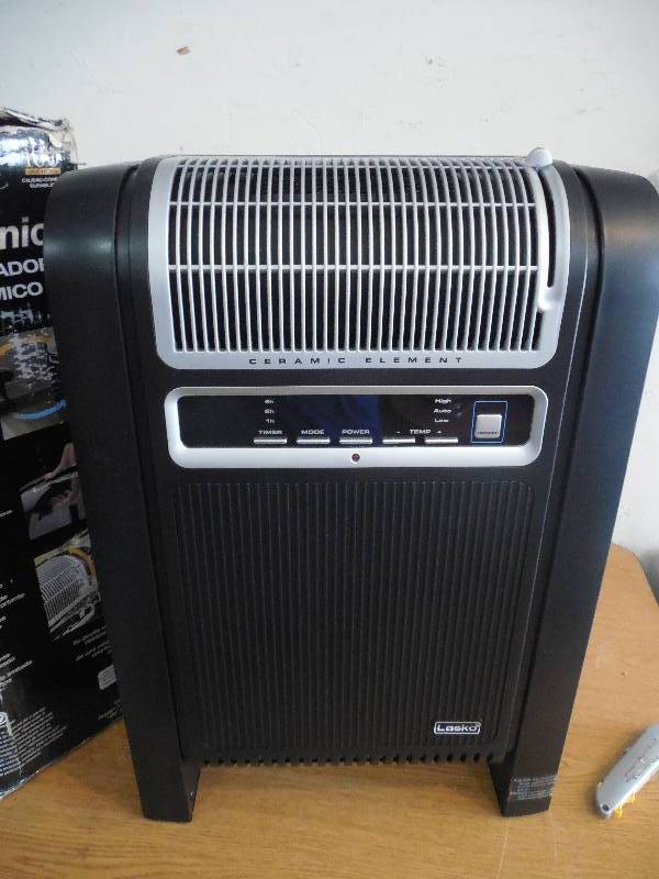 lot 36 image: Lasko Cyclonic Heater with Remote