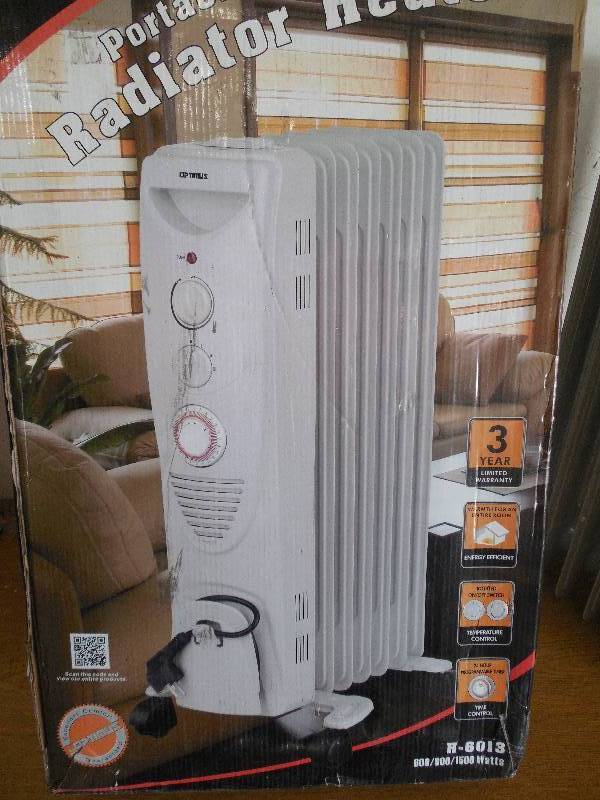 lot 53 image: Optimus Oil-Filled Radiator Heater
