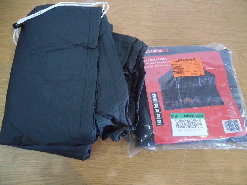lot 11 image: (2) 55 in. Grill Cover