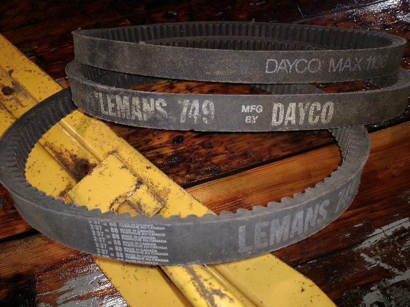 lot 28 image: Vintage Snowmobile Engine Motor Rubber Belts (3), Vintage Snowmobile Straight Yellow Ski