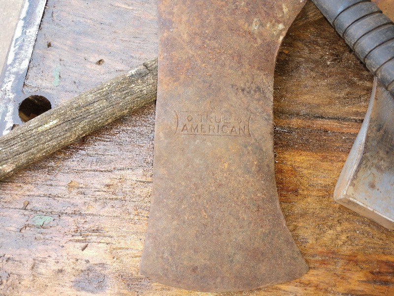 lot 80 image: Antique Axes (4) and Axe Heads (3)