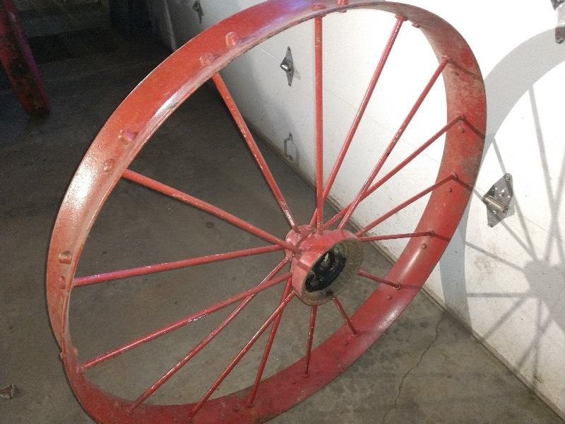 lot 105 image: Vintage Steel Wagon Wheel