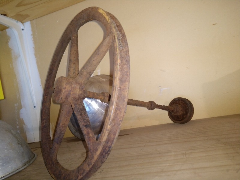 lot 115 image: Cast Iron Pulley and Aluminum Light Hood