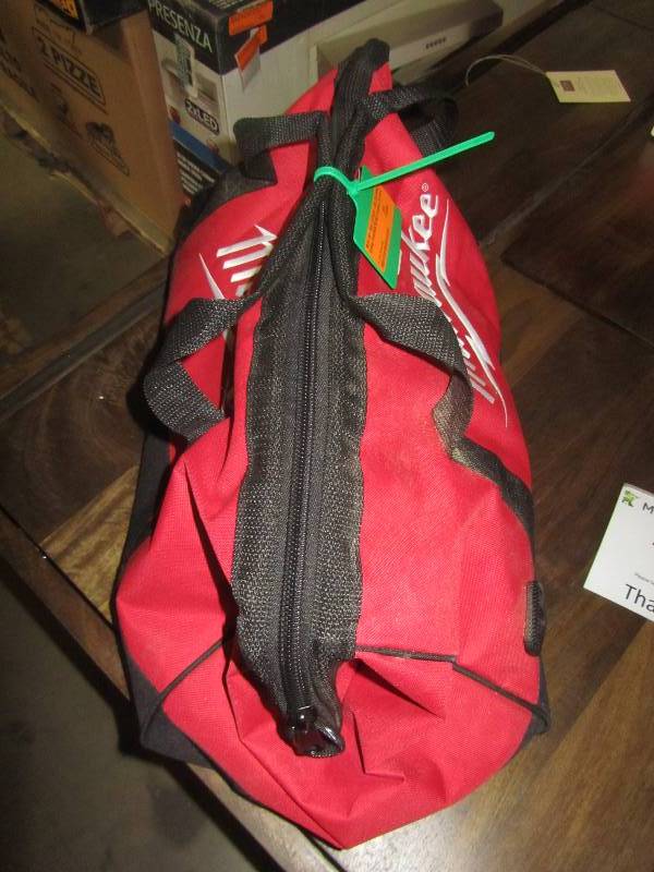 lot 74 image: Milwaukee M18 18-Volt Lithium-Ion Cordless Hammer DrillHACKZALLImpact DriverLight Combo Kit (4-Tool)