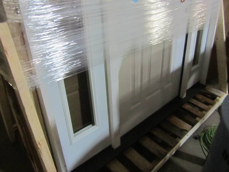 lot 89 image: Steves and Sons 72 in. x 80 in. 9-Panel Primed White Left-Hand Steel Prehung Front Door with 16 in. Clear Glass Sidelites 4 in. Wall