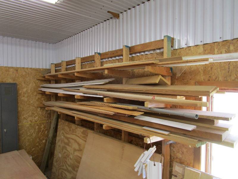 lot 127 image: Assorted Wood Pcs  Wall Rack