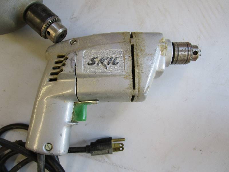 lot 64 image: (2) 38 Drills Skill & Black & Decker