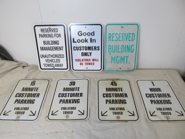 lot 85 image: Lot of 7 Metal Parking Signs