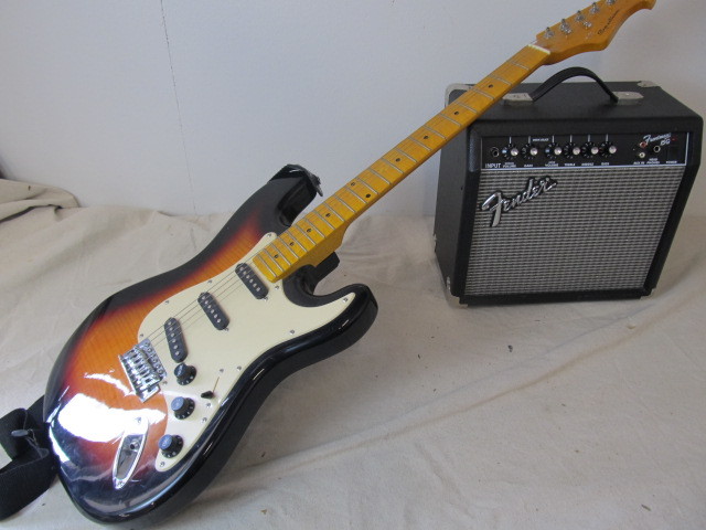 lot 103 image: Spectrum Electric Guitar wFender Amplifier