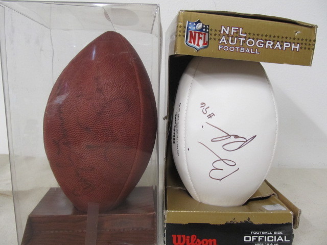 lot 97 image: Pair of Autographed Footballs - Brian Robison Jim Plunkett 