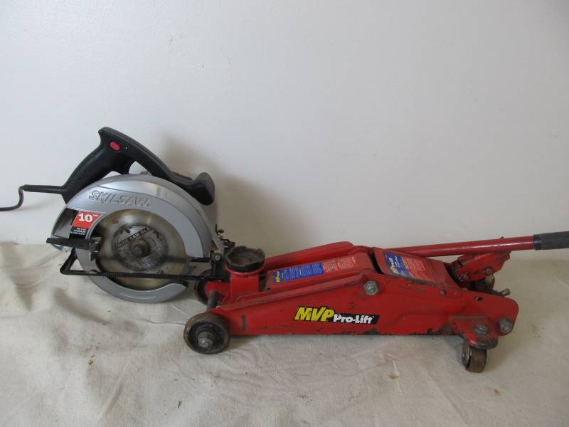 lot 120 image: 2-Ton Floor Jack & Circular Saw