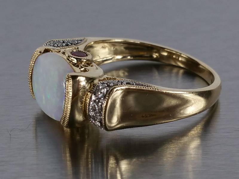 lot 30 image: Opal, Diamond, and Ruby Ring in 14k Gold - $3150 Retail
