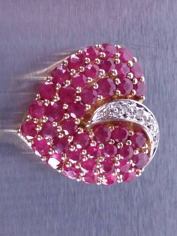 lot 58 image: Natural Ruby and Diamond Pendant in Yellow Gold