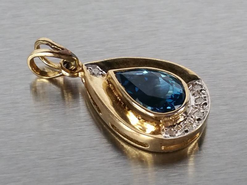 lot 61 image: Aquamarine and Diamond Pendant in 14k Gold