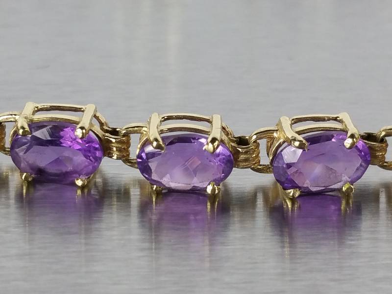 lot 66 image: 20ct Amethyst Tennis Bracelet in Yellow Gold