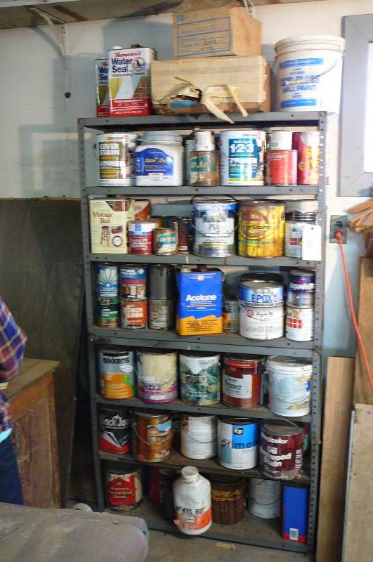 lot 80 image: Rack 36w x 12d x 67 tall, Includes contents on shelf, Water repellent, Paint, Stain, Primer, Thompson water Seal & Misc.