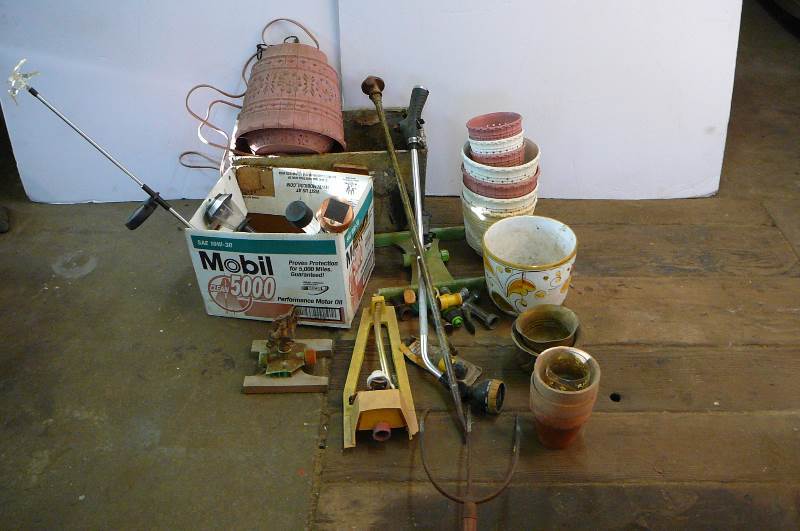 lot 91 image: Lot of garden planters, Lights, pitchfork with no handle, wooden box, sprinklers