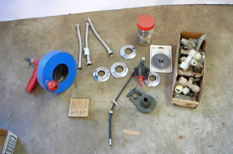lot 106 image: Plumbing snake, flex hoses and lots of fittings