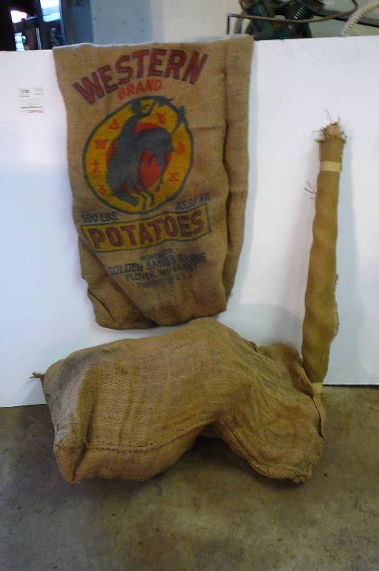 lot 118 image: Burlap bags and a roll of burlap