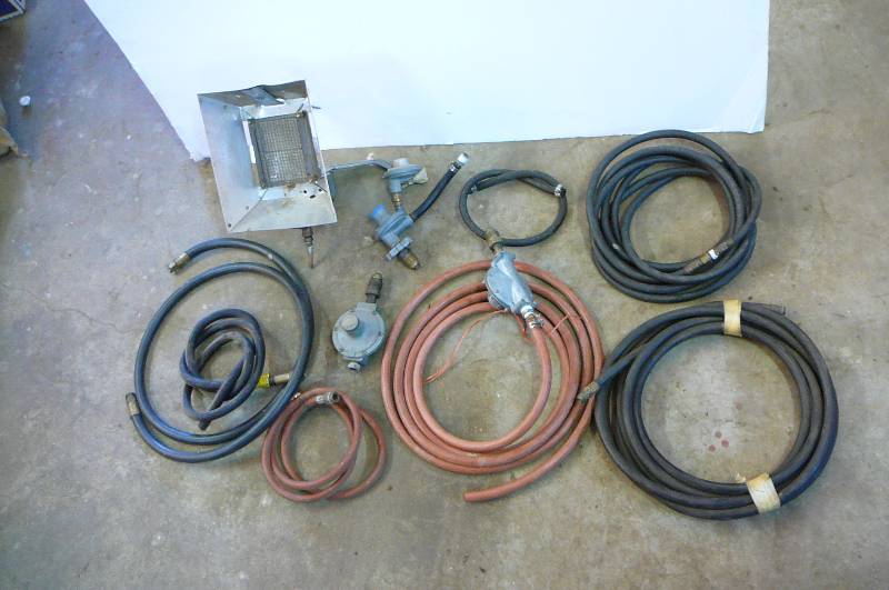 lot 135 image: LP gas parts, 4 regulators, 1 gas heater lot of different LP hoses