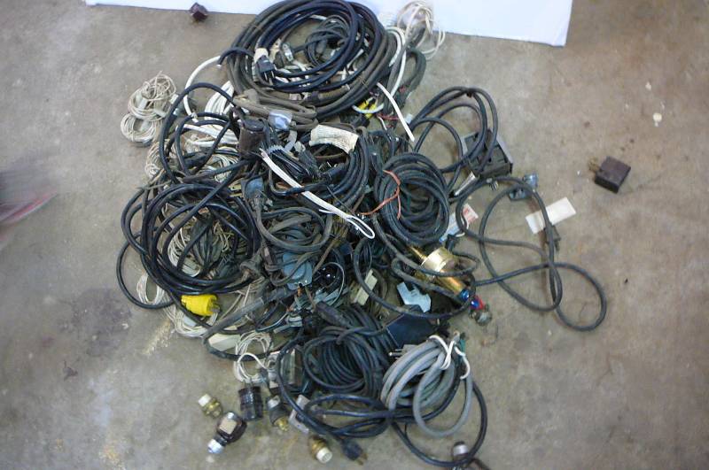 lot 140 image: Large lot of misc electrical wire extension cords, plug ins