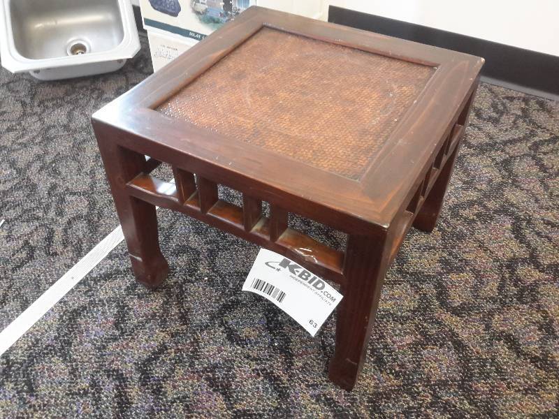 lot 63 image: small side table with woven material top..