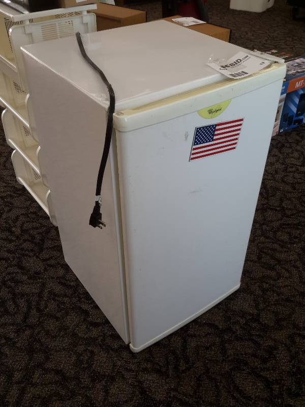lot 19 image: Whirlpool, Small Refrigerator.. 3.94 Cu Ft with Freezer
