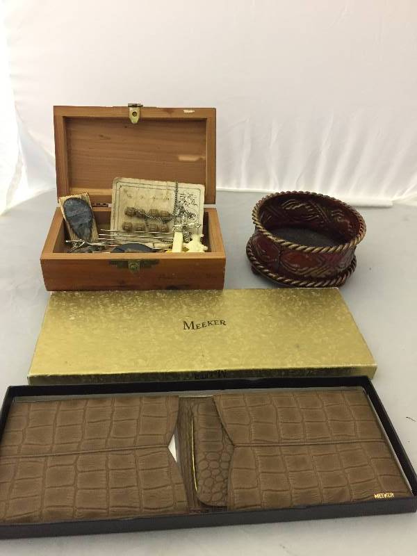 lot 84 image: MOTHER box, Meeker wallet, more